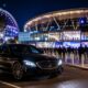 Luxury chauffeur vehicle arriving at AfterPay Arena Sydney Olympic Park for a concert or major event