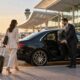 LuxCar airport chauffeur welcoming a traveller at Melbourne Airport